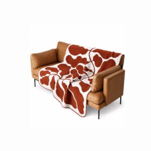 Abstract Botanical Throw Blanket Abstract botanical throw blanket for modern homes in Lagos, Nigeria, featuring an artistic botanical pattern for sofas, beds, armchairs, and luxury interiors.