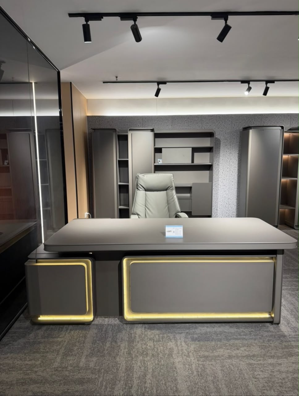 Luxe illuminated executive desk for premium offices in Lagos, Nigeria, featuring a contemporary design with integrated lighting for sophisticated workspaces.