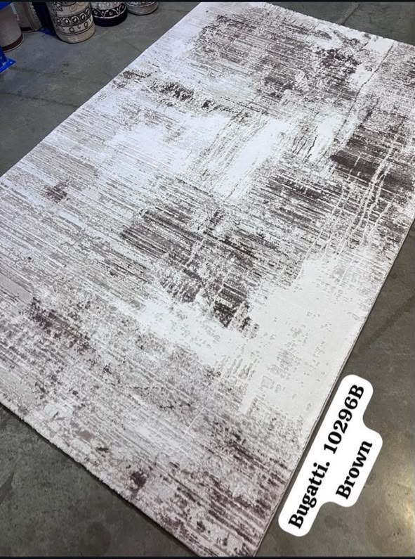 Luxury modern rug in Lagos, Nigeria, available in multiple sizes to elevate contemporary homes with comfort and style.