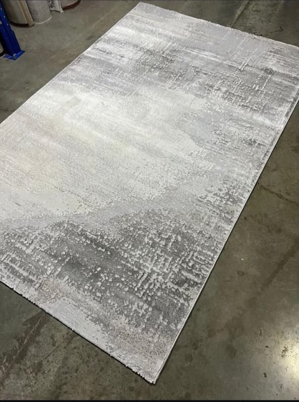 Luxury modern rug for homes in Lagos, Nigeria, available in multiple sizes for living rooms, bedrooms, dining areas, and stylish interiors.