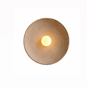 Textured Halo wall light for modern homes in Lagos, Nigeria, featuring a contemporary textured design and warm ambient illumination for elegant interiors.