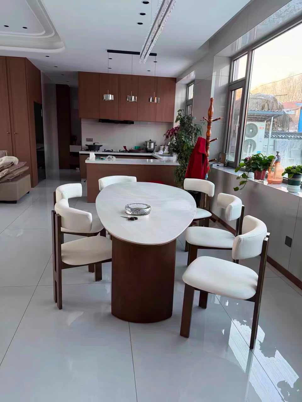 Luxury travertine top 6-seater dining set for modern homes in Lagos, Nigeria, featuring a 1.8-metre table with premium contemporary craftsmanship.